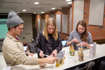 students taste testing food products