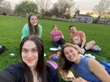 SOND nutrition students relaxing on lawn