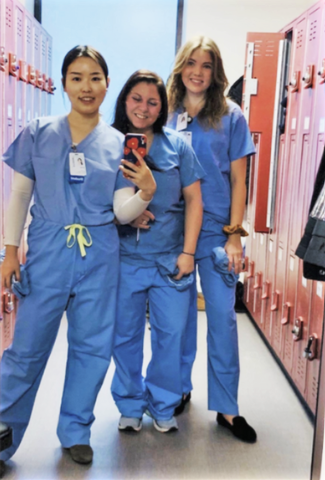 dietetic interns in hospital scrubs